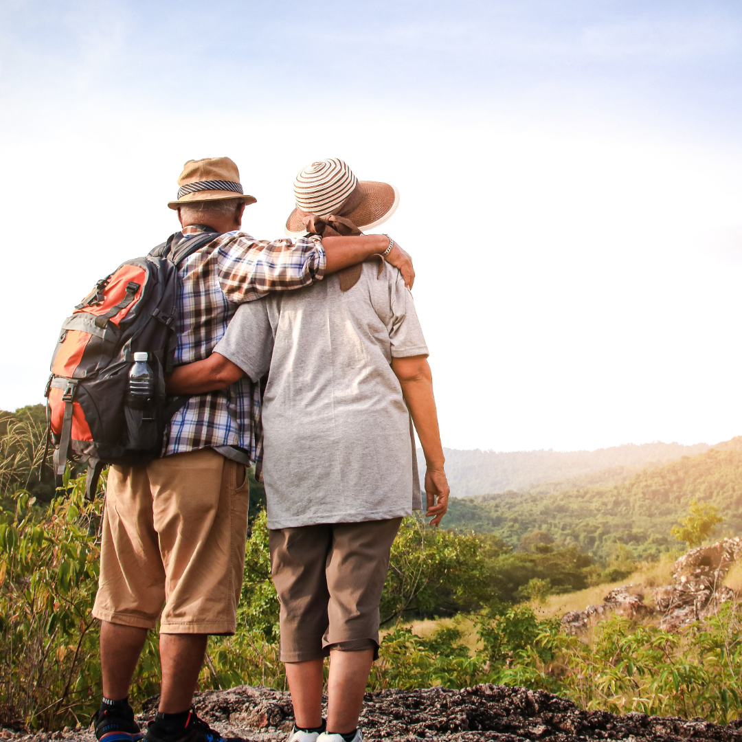 Couple on a hike with hills – 1