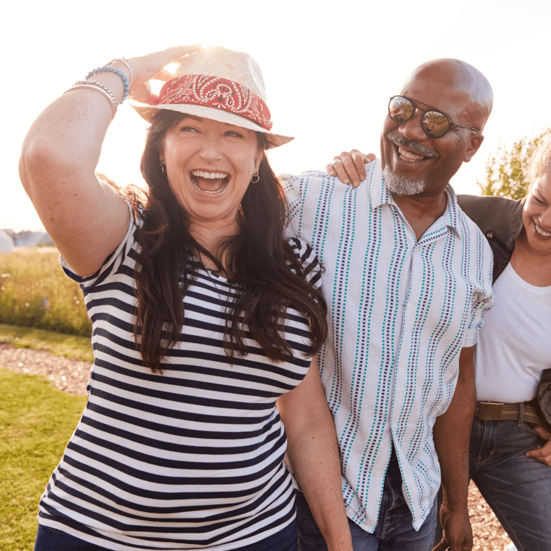 Group of friends outside on a walk laughing – 1